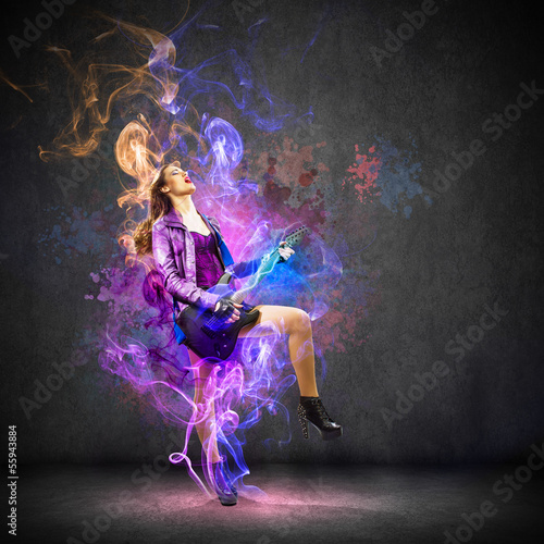 Photo: Rock passionate girl with black wings Rock passionate girl with black wings
