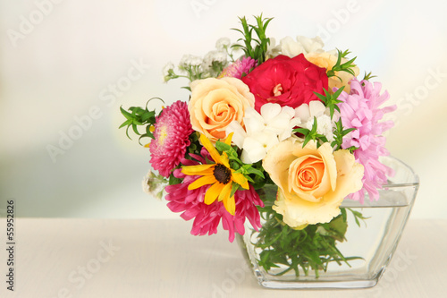 Photo: Beautiful bouquet of bright flowers in glass vase, Beautiful bouquet of bright flowers in glass vase,