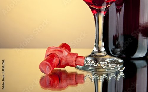 Photo: bottle and a glass of wine bottle and a glass of wine