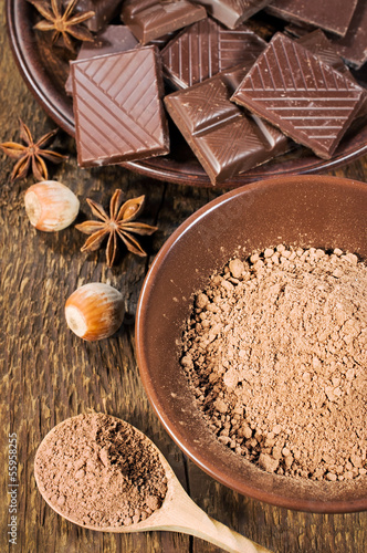 Photo: chocolate, nuts and cocoa powder chocolate, nuts and cocoa powder