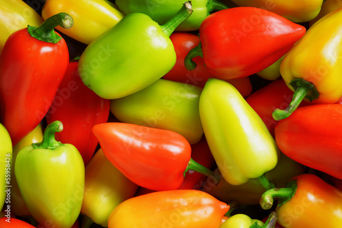 Photo: Fresh sweet peppers. Vegetable background Fresh sweet peppers. Vegetable background