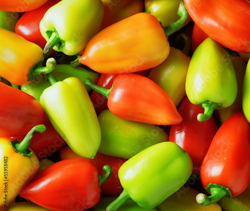 Photo: Fresh sweet peppers. Vegetable background Fresh sweet peppers. Vegetable background