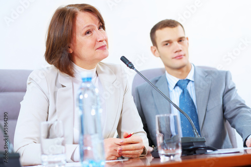 Photo: Two businesspeople at meeting Two businesspeople at meeting