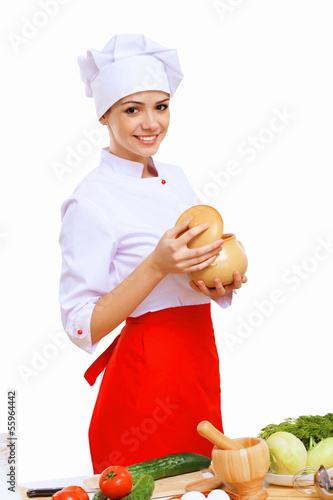 Photo: Young cook preparing food Young cook preparing food