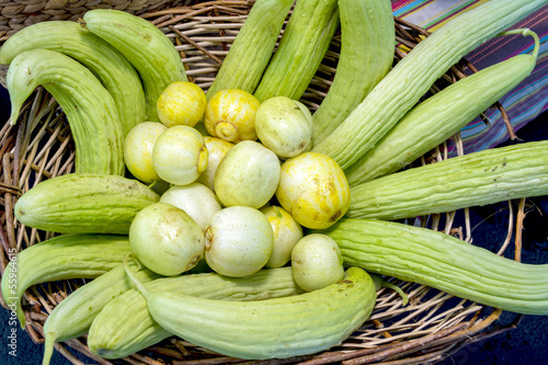 Photo: Assortment of vegetables in a basket at a local market Assortment of vegetables in a basket at a local market