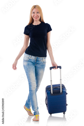 Photo: Woman preparing for vacation on white Woman preparing for vacation on white