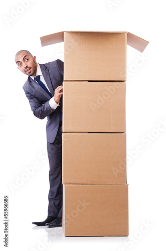 Photo: Businessman with box isolated on the white Businessman with box isolated on the white