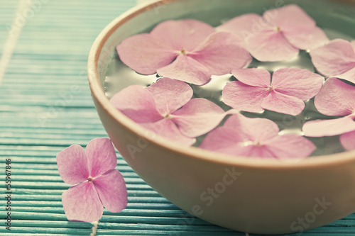 Photo: Flowers in bowl of water Flowers in bowl of water