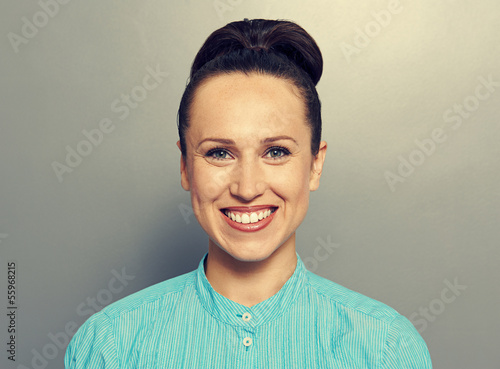 Photo: beautiful young woman smiling beautiful young woman smiling