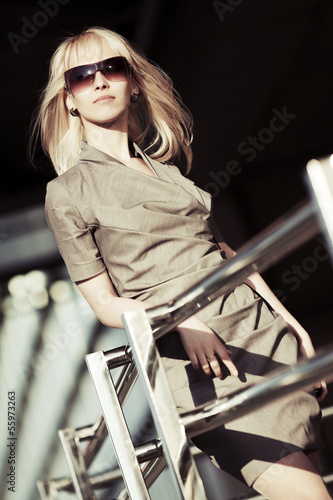 Photo: Blond woman in sunglasses Blond woman in sunglasses