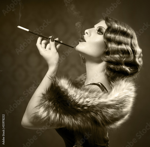 Photo: Smoking Retro Woman. Vintage Styled Black and White Photo Smoking Retro Woman. Vintage Styled Black and White Photo
