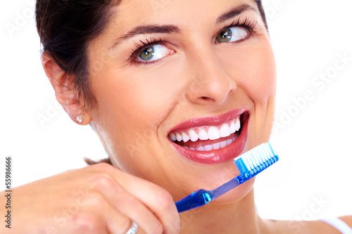 Photo: Beautiful woman with toothbrush. Beautiful woman with toothbrush.