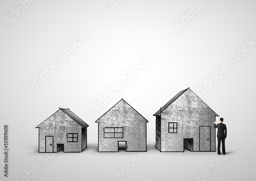 Photo: man drawing houses man drawing houses