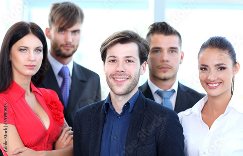 Photo: Closeup portrait of a successful business team laughing together Closeup portrait of a successful business team laughing together