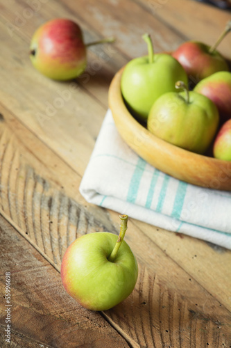 Photo: Ripe delicious apples on wooden table Ripe delicious apples on wooden table