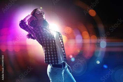 Photo: Young girl listens to music Young girl listens to music