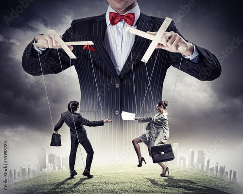 Photo: Businessman puppeteer Businessman puppeteer