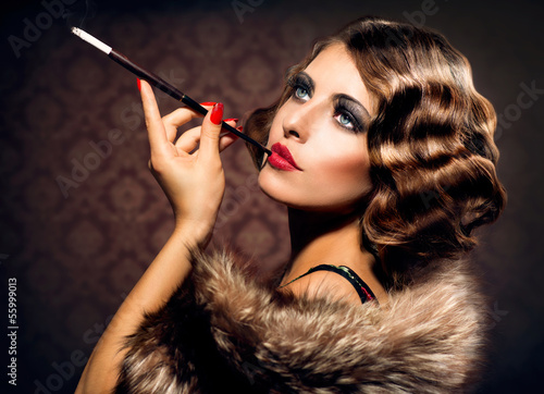 Photo: Retro Woman Portrait. Beautiful Woman with Mouthpiece Retro Woman Portrait. Beautiful Woman with Mouthpiece