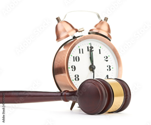 Photo: Gavel and old clock Gavel and old clock