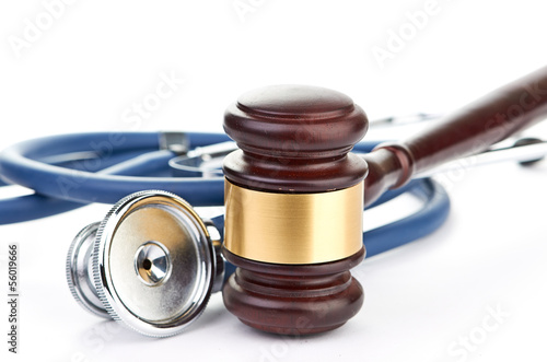 Photo: brown gavel and a medical stethoscope brown gavel and a medical stethoscope