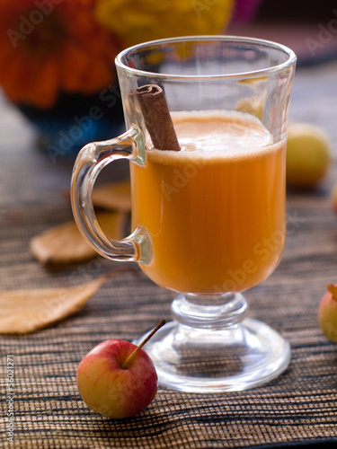 Photo: Fresh apple hot drink with cinnamon, selective focus Fresh apple hot drink with cinnamon, selective focus