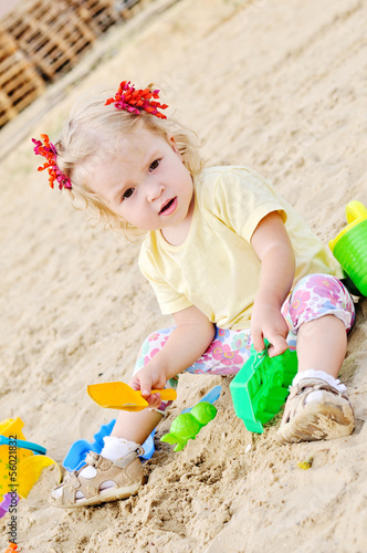 Photo: girl in sand girl in sand