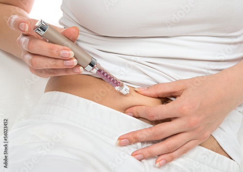 Photo: abdomen subcutaneous insulin syringe pen injection vaccination abdomen subcutaneous insulin syringe pen injection vaccination