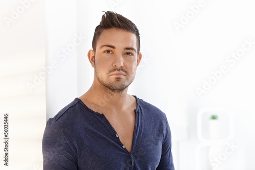 Photo: Portrait of serious looking young man Portrait of serious looking young man