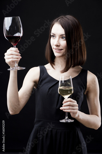 Photo: woman holding wine glass woman holding wine glass