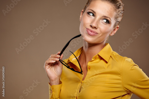 Photo: Young businesswoman in autumn colors Young businesswoman in autumn colors