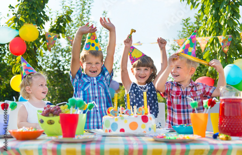 Photo: Group of kids having fun at birthday party Group of kids having fun at birthday party