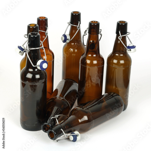 Photo: Acht leere Bierflaschen Acht leere Bierflaschen