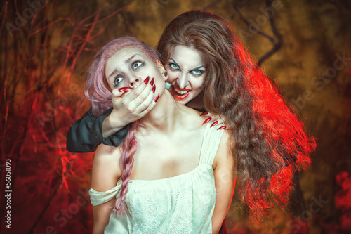 Photo: Halloween vampire and her victim Halloween vampire and her victim