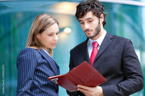 Photo: Couple of businesspeople Couple of businesspeople