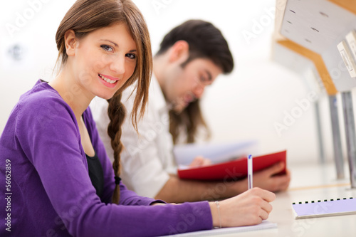 Photo: Students studying in a library Students studying in a library