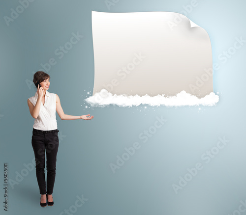 Photo: pretty woman making phone call and presenting modern copy space pretty woman making phone call and presenting modern copy space