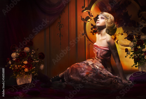 Photo: Aristocratic Woman in Luxury Vintage Interior Looking Up Aristocratic Woman in Luxury Vintage Interior Looking Up