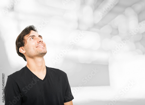 Photo: Handsome man looking up Handsome man looking up