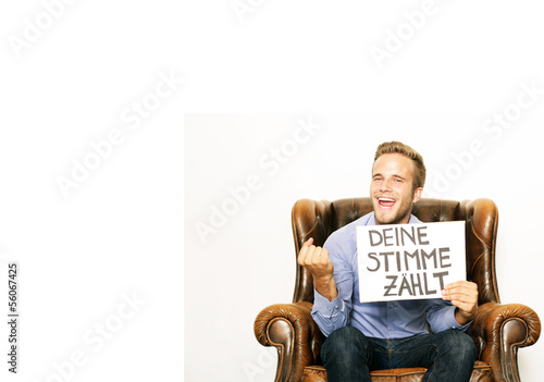 Photo: Mann mit Plakat Mann mit Plakat