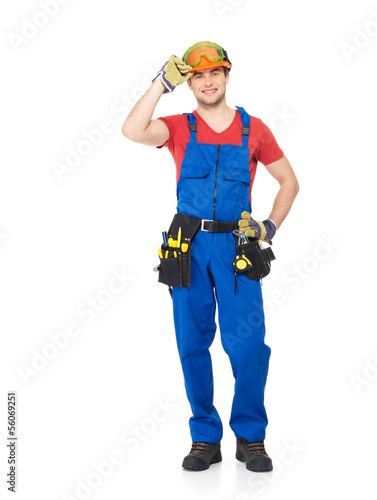 Photo: Handyman with tools full portrait isolated Handyman with tools full portrait isolated