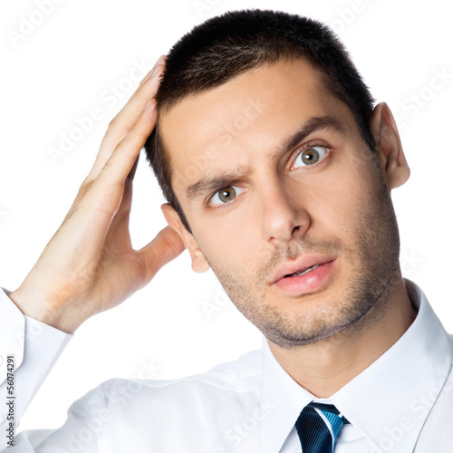 Photo: Portrait of thinking businessman, on white Portrait of thinking businessman, on white