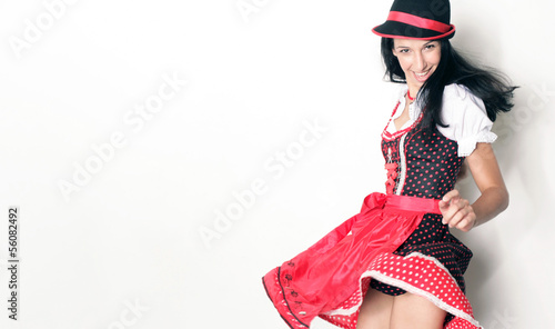 Photo: Lustiges Mädchen im Dirndl Lustiges Mädchen im Dirndl