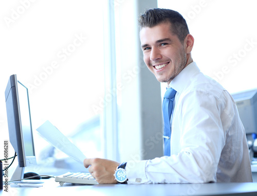 Photo: Businessman using laptop Businessman using laptop