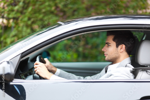 Photo: Man driving his car Man driving his car