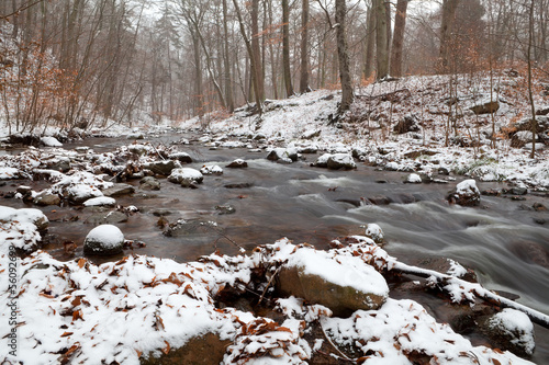 Photo: mountain river in winter forest mountain river in winter forest