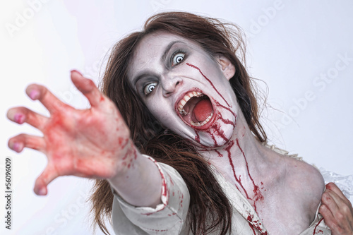Photo: Psychotic Bleeding Woman in a Horror Themed Image Psychotic Bleeding Woman in a Horror Themed Image