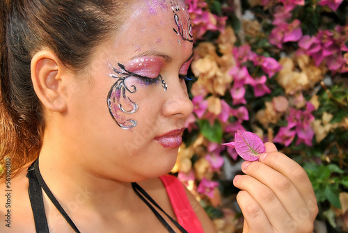 Photo: Woman with face painted Woman with face painted