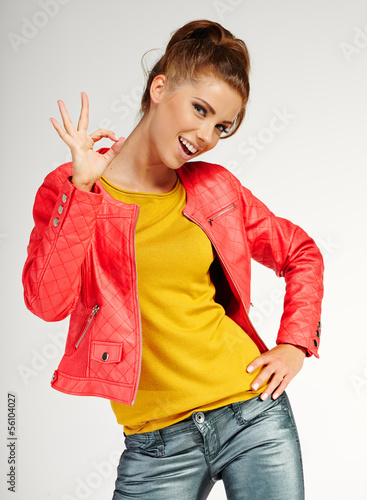 Photo: Smiling woman with thumbs up Smiling woman with thumbs up