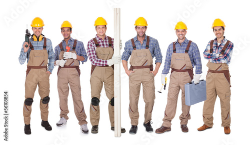 Photo: Group Of Workers With Equipment Group Of Workers With Equipment