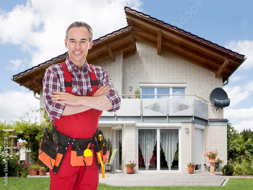 Photo: Smiling confident construction worker Smiling confident construction worker